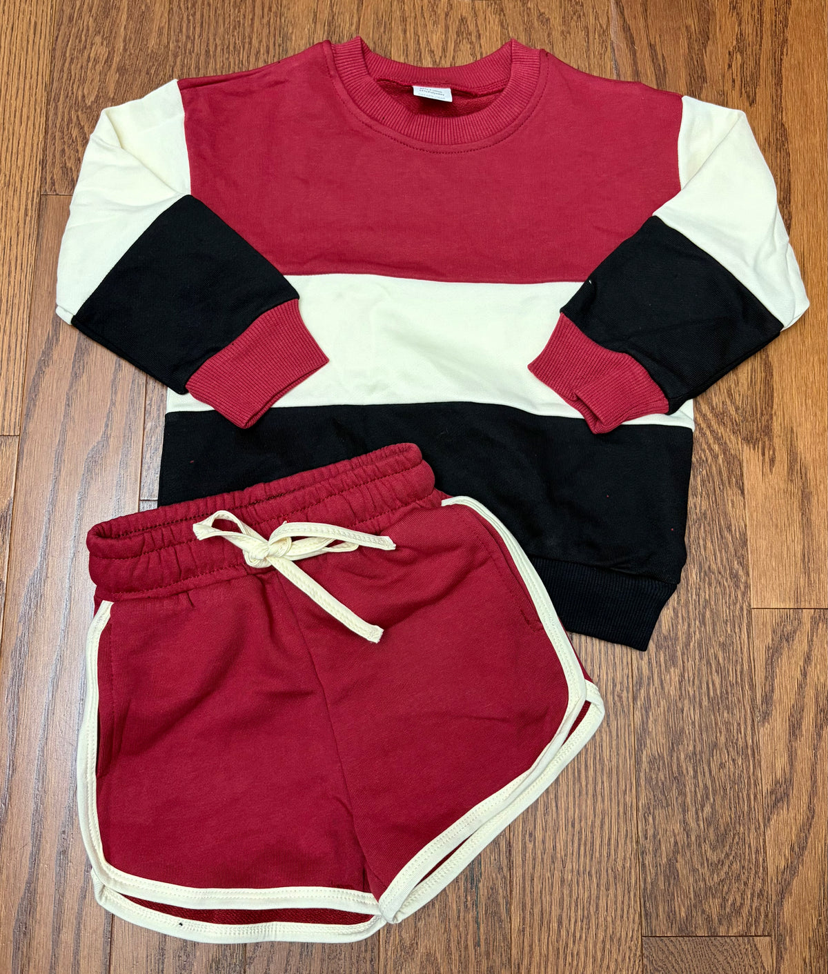 Garnet, black, and cream girl sweater short set