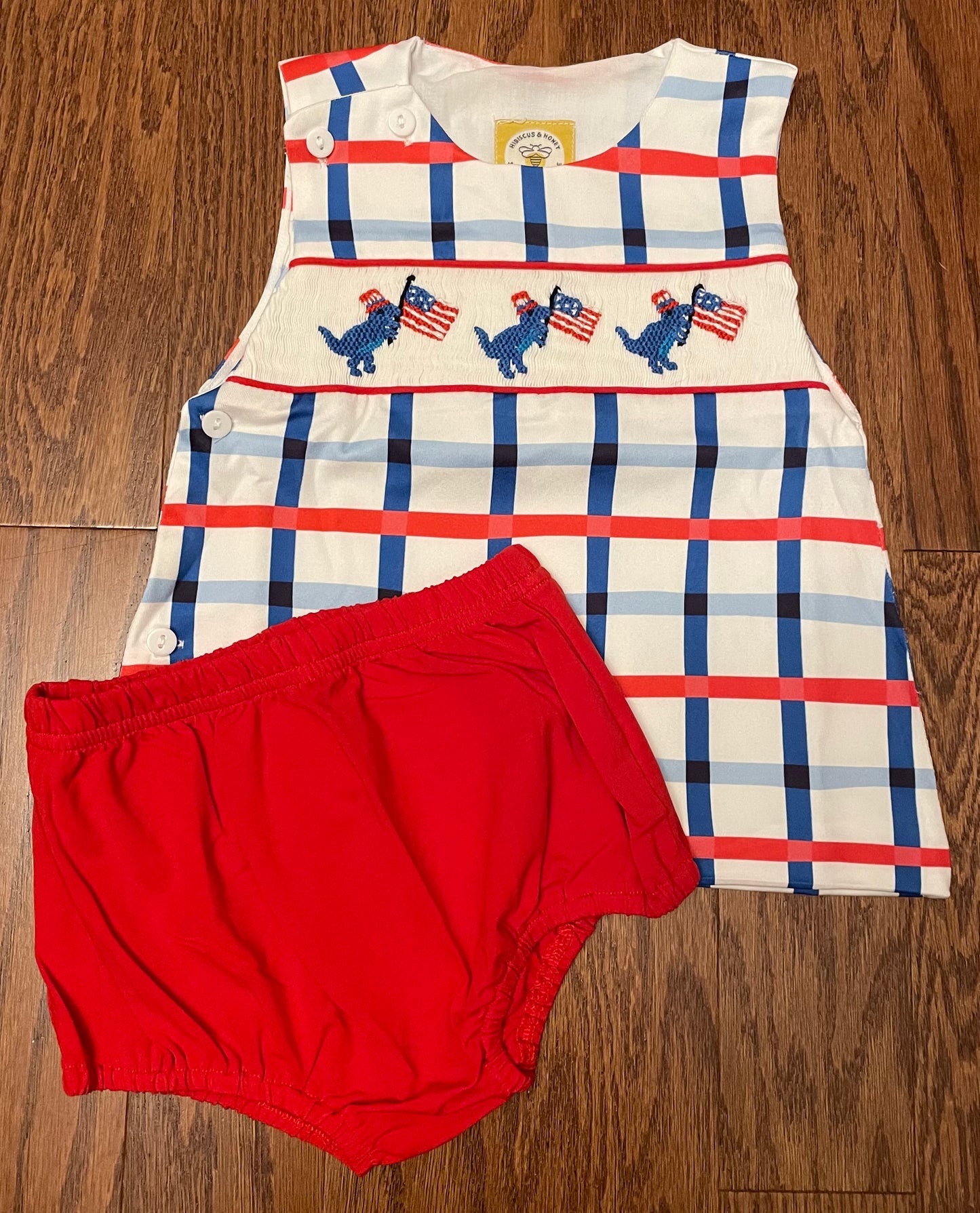 Smocked dinosaur holding the flag boys diaper set