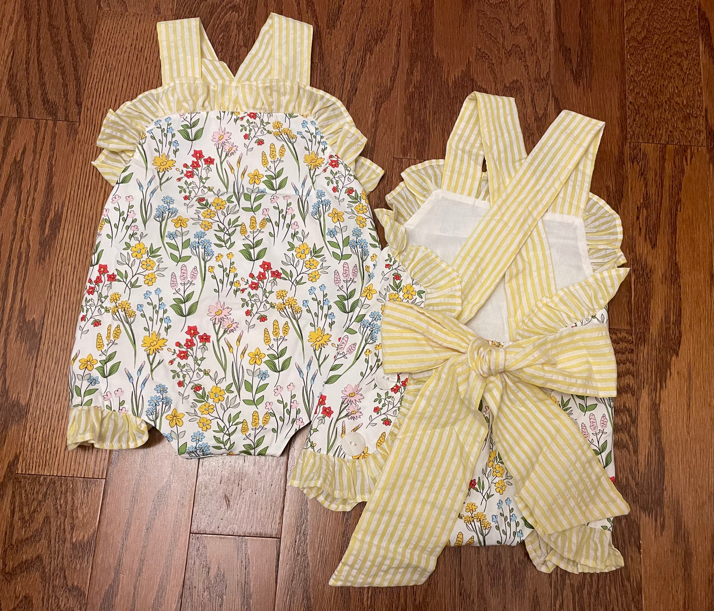 Yellow floral girl sun suit bubble