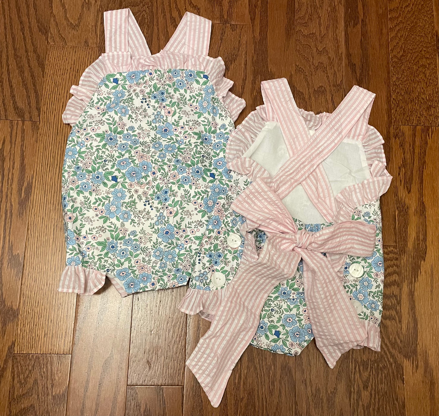 Blue and pink floral girl sun suit bubble