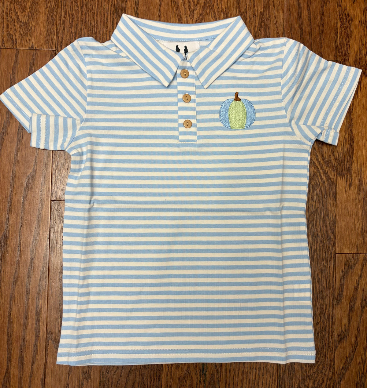 Blue and green boy pumpkin polo