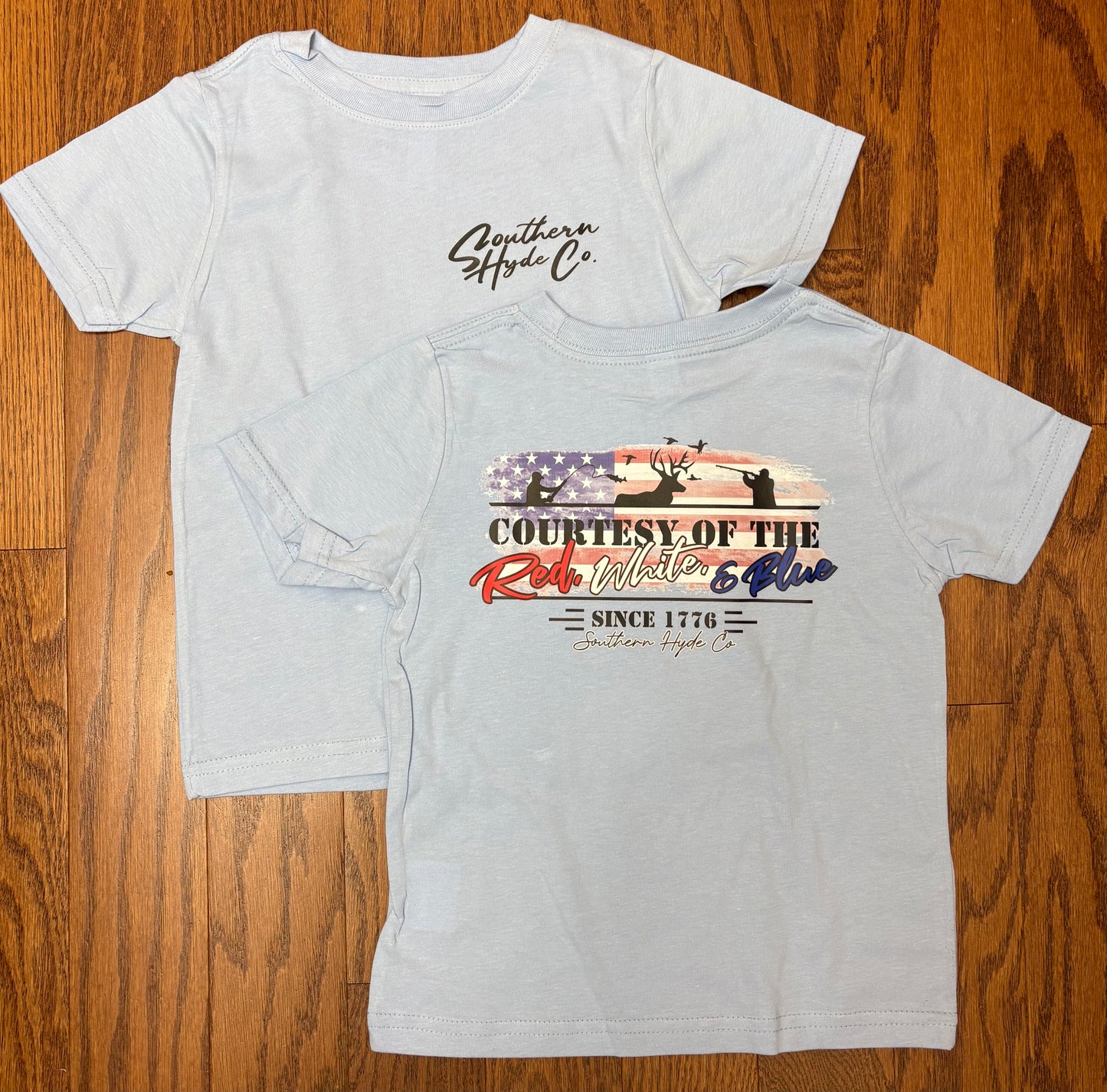 Courtesy of the Red, White, and Blue Tee